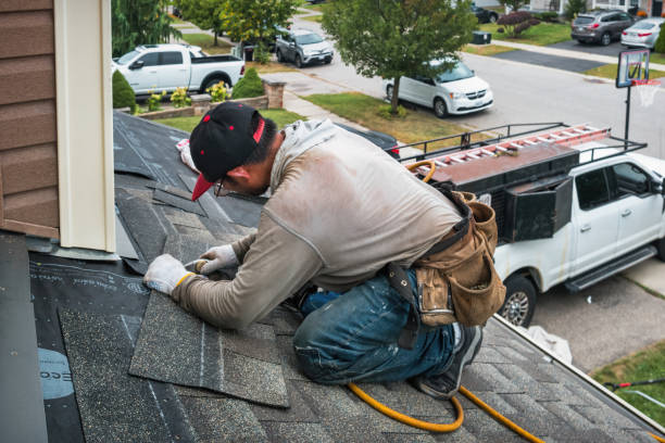 Professional Roof Replacement technician working in Beverly, MA